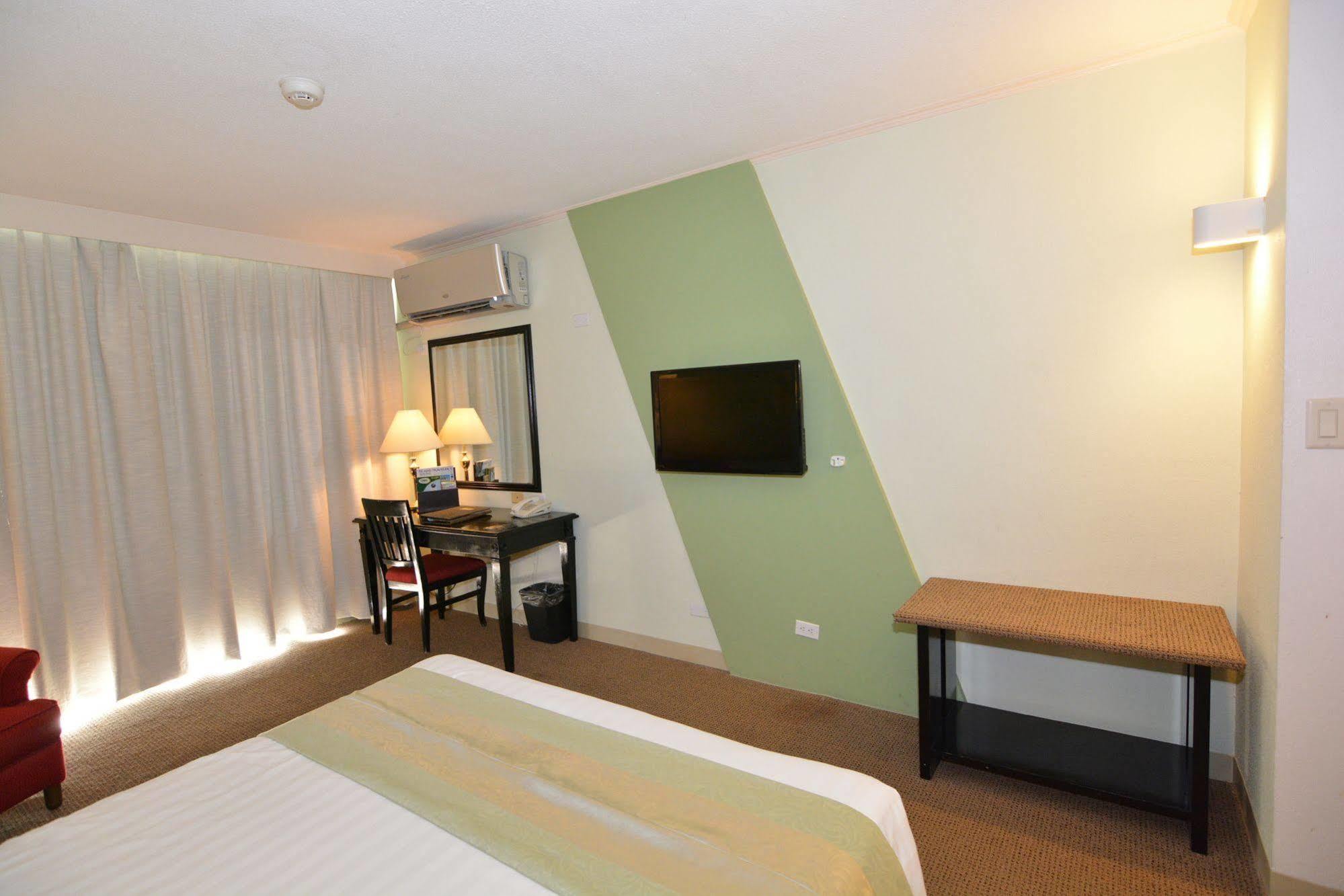 Century Hotel Garapan Kültér fotó